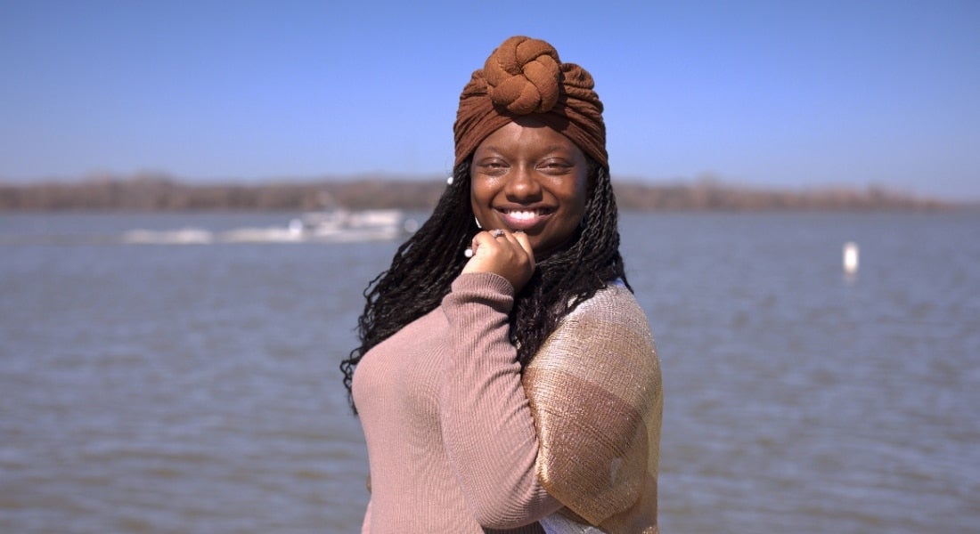Tatyerra Thomas smiling by the water